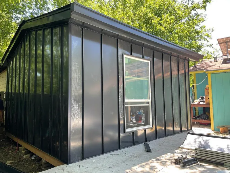 Black standing seam metal wall panels for Metal Roof Installation in Sugar Land